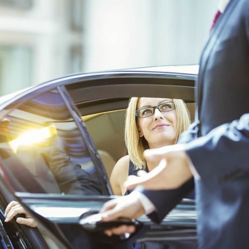 women coming out of the car